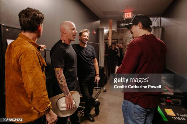 Ryan Peake, Mike Kroeger and Chad Kroeger of Nickelback and HARDY backstage at CMT Crossroads: Nickelback & HARDY at Marathon Music Works on March...
