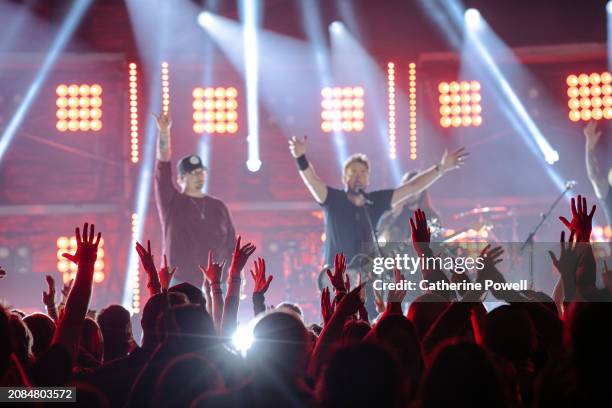 And Chad Kroeger of Nickelback perform at CMT Crossroads: Nickelback & HARDY at Marathon Music Works on March 07, 2024 in Nashville, Tennessee.