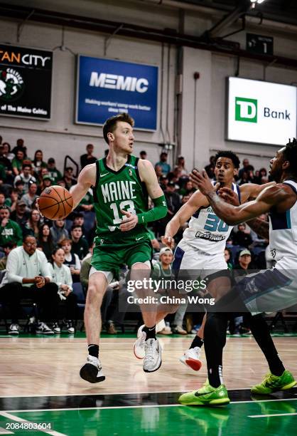 March 17: Drew Peterson of the Maine Celtics looks to pass the ball during the game against the Greensboro Swarm on March 17, 2024 at Portland Expo...