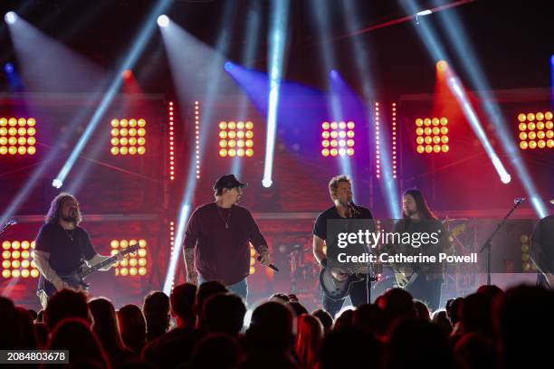 And Chad Kroeger of Nickelback perform at CMT Crossroads: Nickelback & HARDY at Marathon Music Works on March 07, 2024 in Nashville, Tennessee.