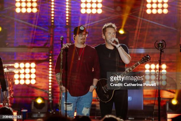 And Chad Kroeger of Nickelback perform at CMT Crossroads: Nickelback & HARDY at Marathon Music Works on March 07, 2024 in Nashville, Tennessee.