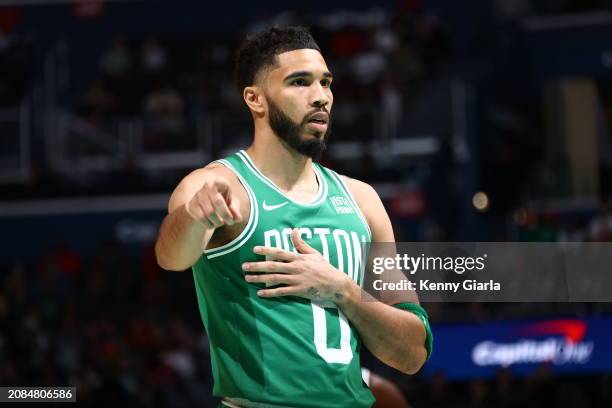 Jayson Tatum of the Boston Celtics looks on during the game against the Washington Wizards on March 17, 2024 at Capital One Arena in Washington, DC....