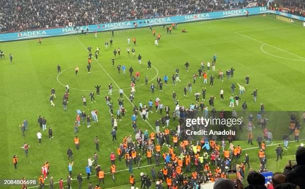 An aerial view of supporters entering on the pitch after the Turkish Super Lig week 30 football match between Trabzonspor and Fenerbahce at Papara...