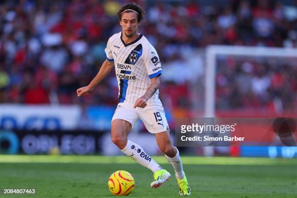Jordi Cotizo of Monterrey runs with the ball during the 12th round match between Atlas and Monterrey as part of the Torneo Clausura 2024 Liga MX at...
