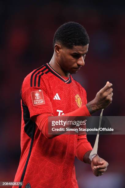 Marcus Rashford of Manchester United looks dejected after the Emirates FA Cup Quarter Final match between Manchester United and Liverpool at Old...