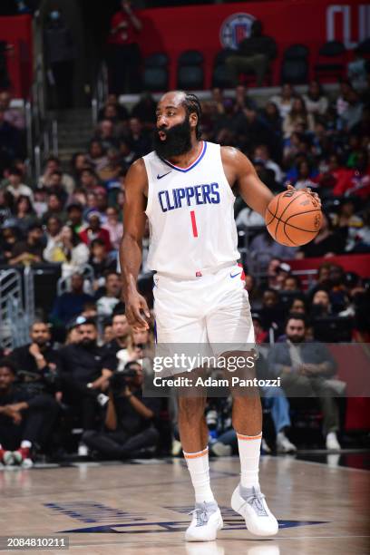 James Harden of the LA Clippers dribbles the ball during the game against the Atlanta Hawks on March 17, 2024 at Crypto.Com Arena in Los Angeles,...