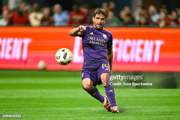 Orlando midfielder Nicolas Lodeiro passes the ball during the MLS match between Orlando City SC and Atlanta United FC on March 17th, 2024 at...