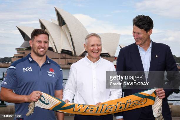 Wallabies team coach Joe Schmidt , laughs as he stands with former Australia's rugby team captain John Eales , and current Wallaby and NSW Waratahs...