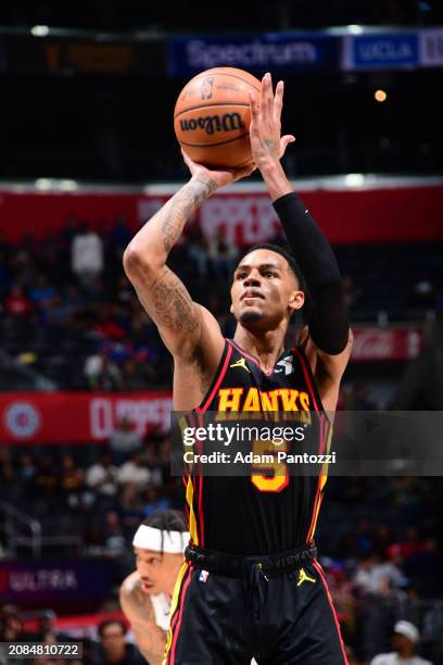 Dejounte Murray of the Atlanta Hawks shoots a free throw during the game against the LA Clippers on March 17, 2024 at Crypto.Com Arena in Los...