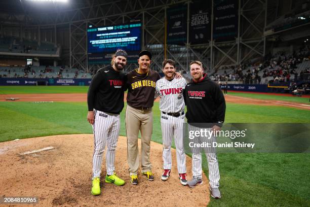 Manny Machado of the San Diego Padres poses with Casey Kelly, Dietrich Enns and Austin Dean of the L.G. Twins during the 2024 Seoul Series game...