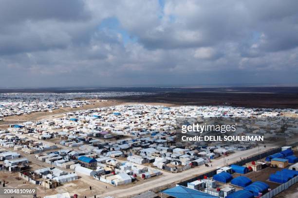 This aerial picture taken on January 27, 2024 shows a view of al-Hol camp in Syria's northeastern Al-Hasakah Governorate. The al-Hol camp is the...