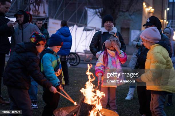 Ukrainian citizens gather to say goodbye to winter and burn the Maslenitsa in Kyiv, Ukraine on March 17, 2024. Traditional festivals of pagan origin...