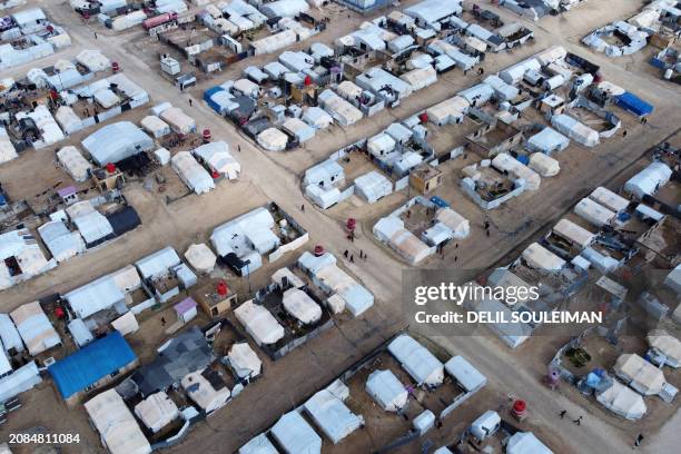 This aerial picture taken on January 27, 2024 shows a view of al-Hol camp in Syria's northeastern Al-Hasakah Governorate. The al-Hol camp is the...