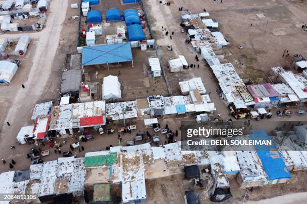 This aerial picture taken on January 27, 2024 shows a view of al-Hol camp in Syria's northeastern Al-Hasakah Governorate. The al-Hol camp is the...