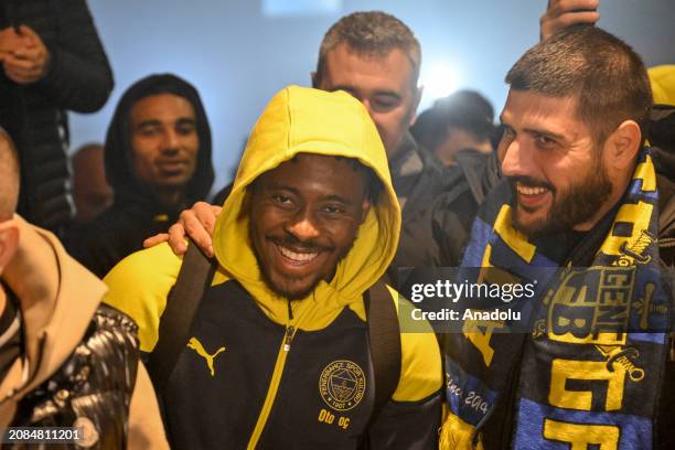 Bright Osayi-Samuel of Fenerbahce arrives in Sabiha Gokcen Airport as fans welcome players after the eventful Turkish Super Lig week 30 match against...