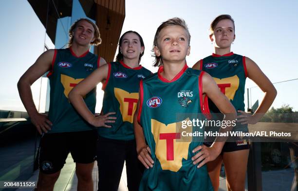 Oliver Kelly, Taya Parker, Jimi Partridge and Caitlin Evans pose during the Tasmania Football Club Launch at Paranaple Convention Centre on March 18,...