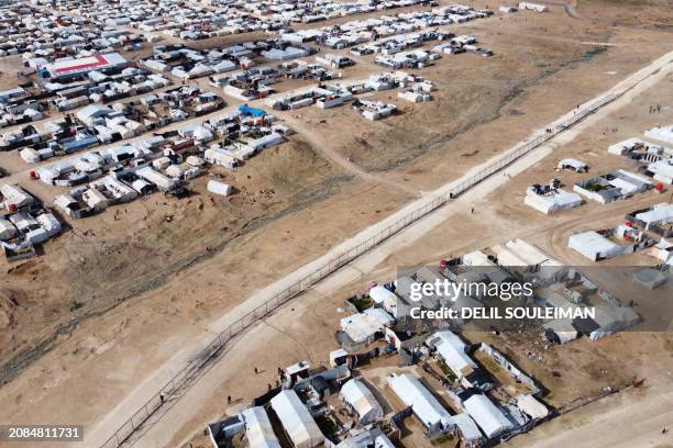 This aerial picture taken on January 27, 2024 shows a view of al-Hol camp in Syria's northeastern Al-Hasakah Governorate. The al-Hol camp is the...