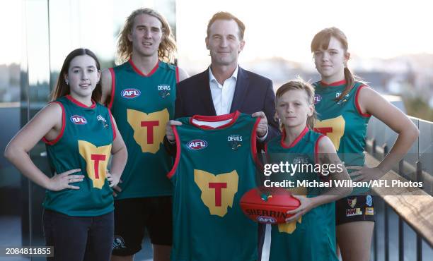 Andrew Dillon, Chief Executive Officer of the AFL poses with Taya Parker, Oliver Kelly, Jimi Partridge and Caitlin Evans during the Tasmania Football...