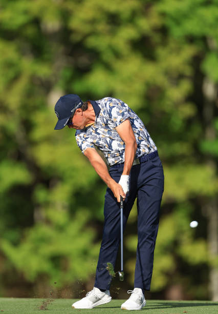 Rickie Fowler of The United States plays his second shot on the 14th hole during the first round of THE PLAYERS Championship on the Stadium Course at...