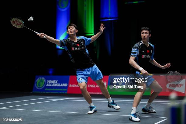 Liu Yuchen and Ou Xuanyi of China compete in the Men's Doubles Second Round match against Lee Yang and Wang Chi-Lin of Chinese Taipei during day...