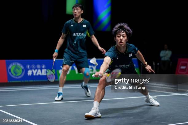 Lee Jhe-Huei and Yang Po-Hsuan of Chinese Taipei compete in the Men's Doubles Second Round match against Liu Yuchen and Ou Xuanyi of China during day...