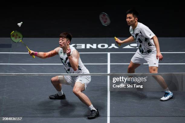 Lee Yang and Wang Chi-Lin of Chinese Taipei compete in the Men's Doubles Second Round match against Liang Weikeng and Wang Chang of China during day...