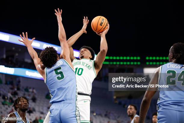 Robert Allen of the North Texas Mean Green shoots in the paint during the AAC Men's Basketball Championship - second round game between Tulane Green...
