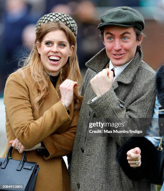 Princess Beatrice and Edoardo Mapelli Mozzi cheer as they watch the racing on day 3 'St Patrick's Thursday' of the Cheltenham Festival at Cheltenham...
