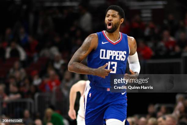 Paul George of the LA Clippers reacts after scoring a 3-point basket in the first half against the Chicago Bulls in at the United Center on March 14,...