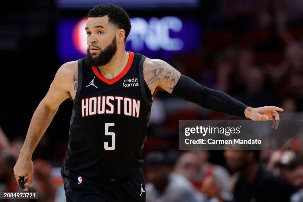 Fred VanVleet of the Houston Rockets reacts to a three point basket against the Washington Wizards during the first half at Toyota Center on March...