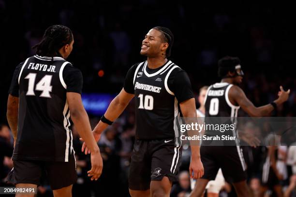 Rich Barron reacts with Corey Floyd Jr. #14 of the Providence Friars in the second half against the Creighton Bluejays during the Quarterfinals of...