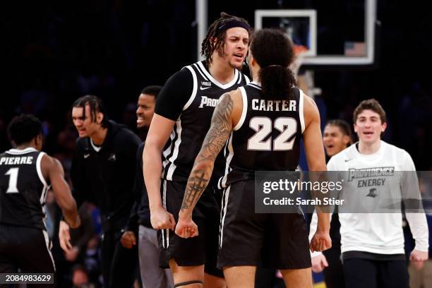 Josh Oduro reacts with Devin Carter of the Providence Friars in the second half against the Creighton Bluejays during the Quarterfinals of the Big...
