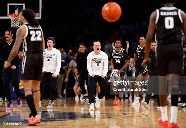 The Providence Friars bench reacts in the second half against the Creighton Bluejays during the Quarterfinals of the Big East Basketball Tournament...