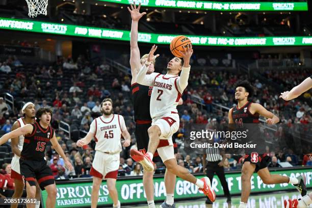 Myles Rice of the Washington State Cougars drives to the basket against the Stanford Cardinal in the second half of a quarterfinal game of the Pac-12...
