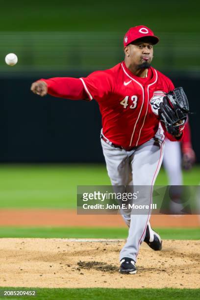 Alexis Diaz of the Cincinnati Reds pitches during the Spring Training Game against the Texas Rangers at Surprise Stadium on March 14, 2024 in...