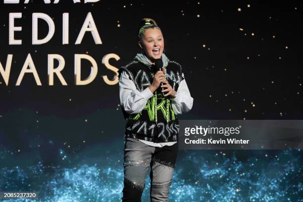 JoJo Siwa speaks onstage during the 35th annual GLAAD Media Awards at The Beverly Hilton on March 14, 2024 in Beverly Hills, California.