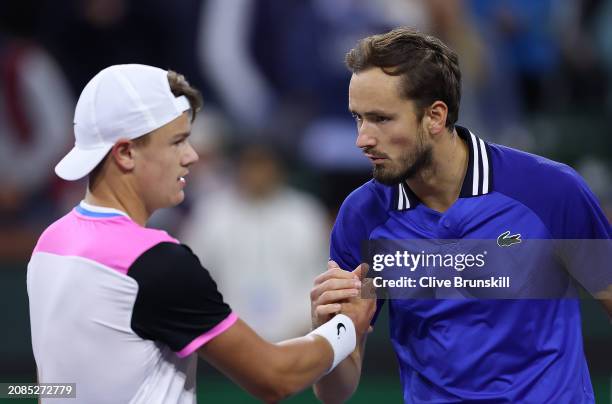 Daniil Medvedev at the net after his straight sets victory against Holger Rune of Denmark in their Quarterfinal match during the BNP Paribas Open at...