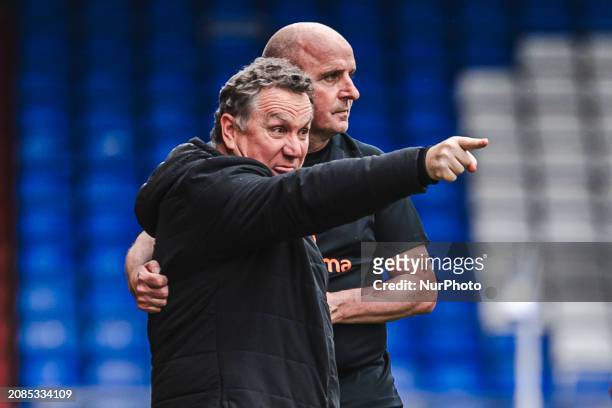 Micky Mellon, the manager of Oldham Athletic, and Paul Cook, the manager of Chesterfield, are attending the Vanarama National League match between...