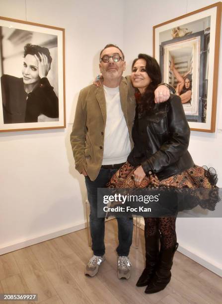 Photographer Gerard Harten and actress Catherine Wilkening attend "Portraits Croisés" Gerard Harten’s Photo Exhibition Preview at Galerie Roanne de...