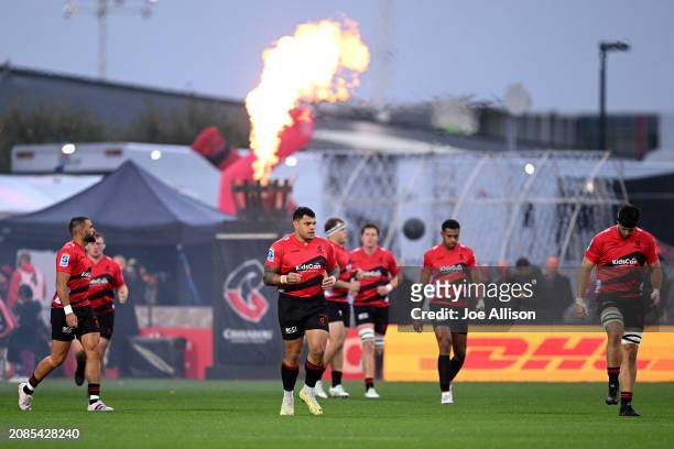 Levi Aumua of the Crusaders runs out ahead of the round four Super Rugby Pacific match between Crusaders and Hurricanes at Apollo Projects Stadium,...