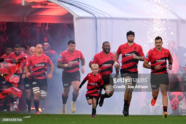 David Havili of the Crusaders runs out ahead of the round four Super Rugby Pacific match between Crusaders and Hurricanes at Apollo Projects Stadium,...
