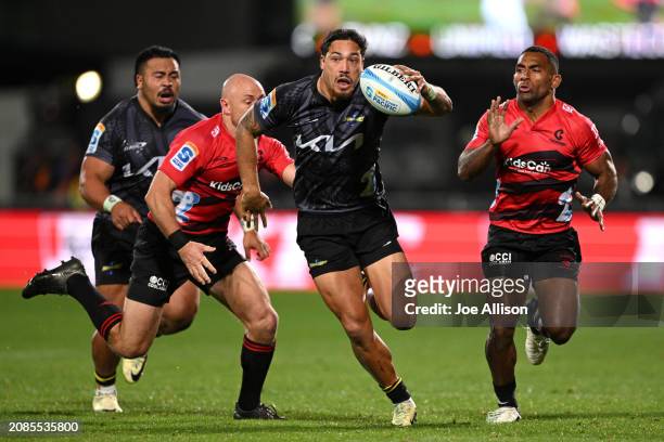 Billy Proctor of the Hurricanes makes a break during the round four Super Rugby Pacific match between Crusaders and Hurricanes at Apollo Projects...