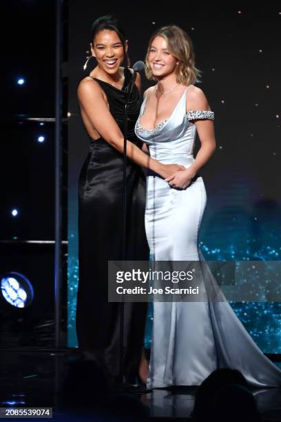 Alexandra Shipp and Sydney Sweeney speak onstage during the 35th GLAAD Media Awards - Los Angeles at The Beverly Hilton on March 14, 2024 in Beverly...