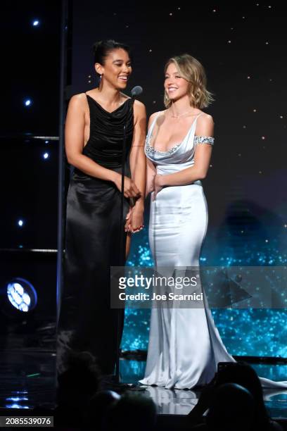 Alexandra Shipp and Sydney Sweeney speak onstage during the 35th GLAAD Media Awards - Los Angeles at The Beverly Hilton on March 14, 2024 in Beverly...