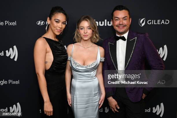 Alexandra Shipp, Sydney Sweeney, and Anthony Allen Ramos, Vice President of Communications and Talent, GLAAD pose backstage during the 35th GLAAD...