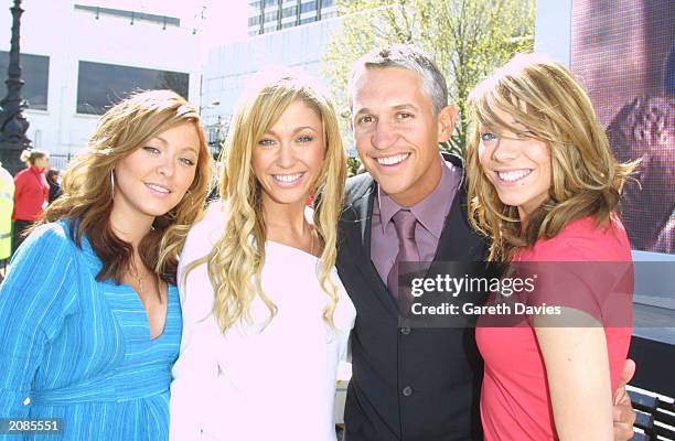 England soccer legend Gary Lineker poses with Atomic Kitten's Natasha Hamilton , Jenny Frost and Liz McClarnon during the launch of T-Mobile, central...