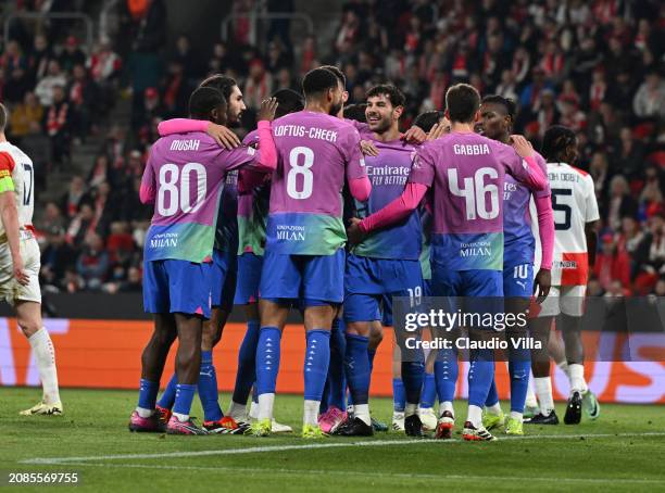 Ruben Loftus Cheek of AC Milan celebrates with team-mates after scoring the goal during the UEFA Europa League 2023/24 round of 16 second leg match...