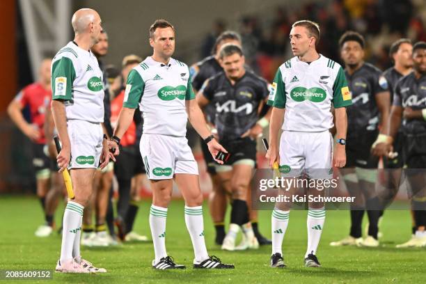 Referee James Doleman and assistants Jono Bredin and Fraser Hanlon during the round four Super Rugby Pacific match between Crusaders and Hurricanes...