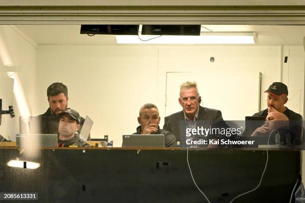 Crusaders coach Rob Penney and the wider coaching team look on from the coaches box at fulltime during the round four Super Rugby Pacific match...