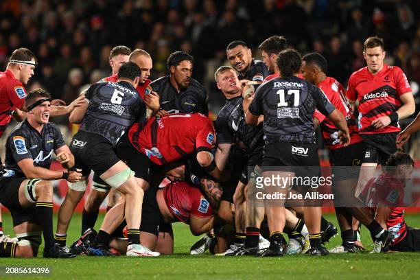 Fight breaks out during the round four Super Rugby Pacific match between Crusaders and Hurricanes at Apollo Projects Stadium, on March 15 in...